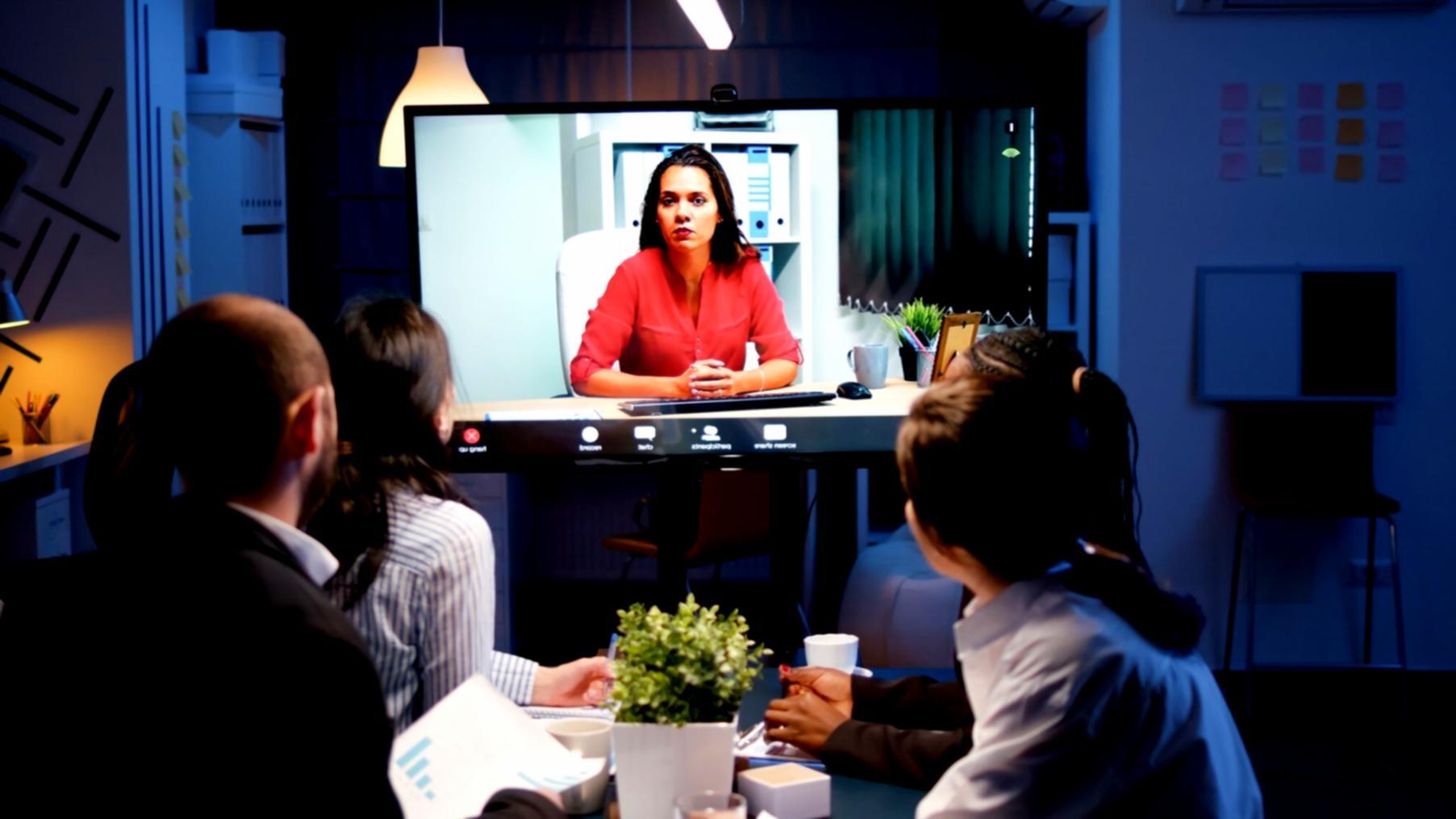 Business professional reviewing financial reports and investment analysis documents