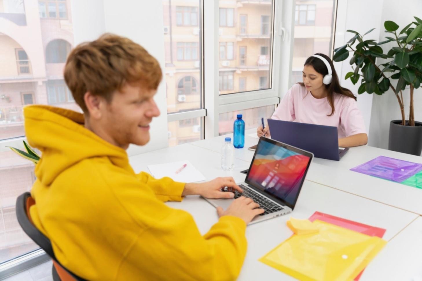 Professional development workshop session with team members learning new financial analysis techniques